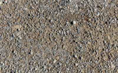 Crushed stone mixed with fines, the kind used as granular sub-base, close-up — stock photo